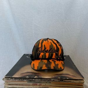 **SOLD** Retro Orange Camo Cabela’s Trucker Hat